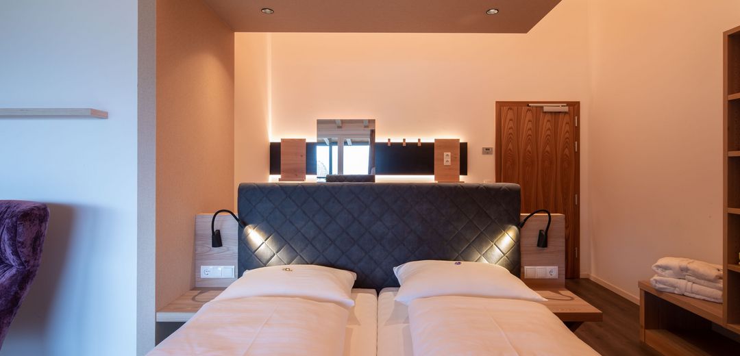 Doppelbett Juniorsuite Hotels Südtirol
