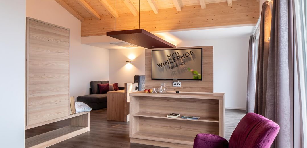 Junior Suite TV area salotto Hotel Val d' Adige